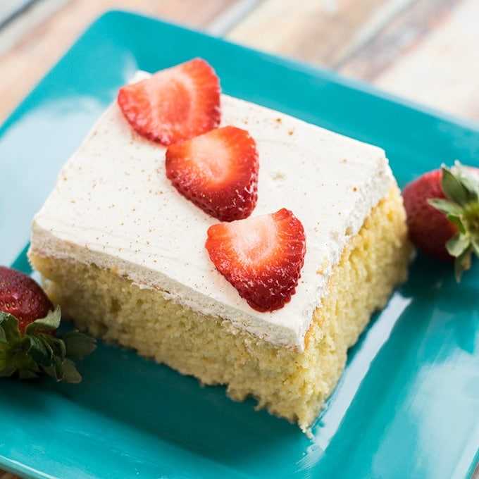 pastel de tres leches on a blue plate