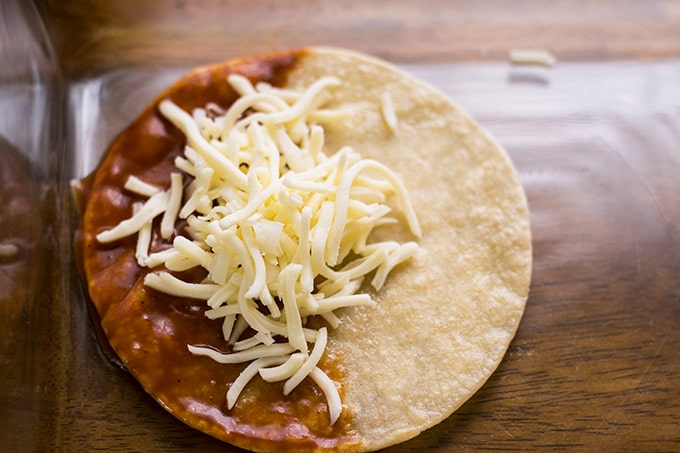 tortilla with enchilada sauce and cheese