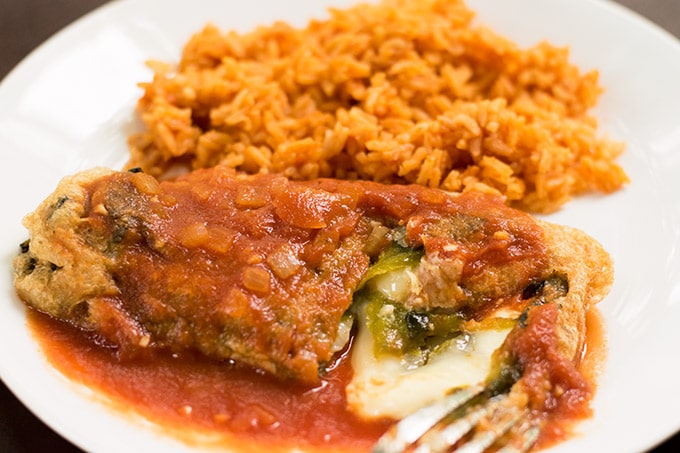 Chiles Rellenos are the Mexican version of stuffed peppers. They make an amazing weeknight dinner and are easier than they look!