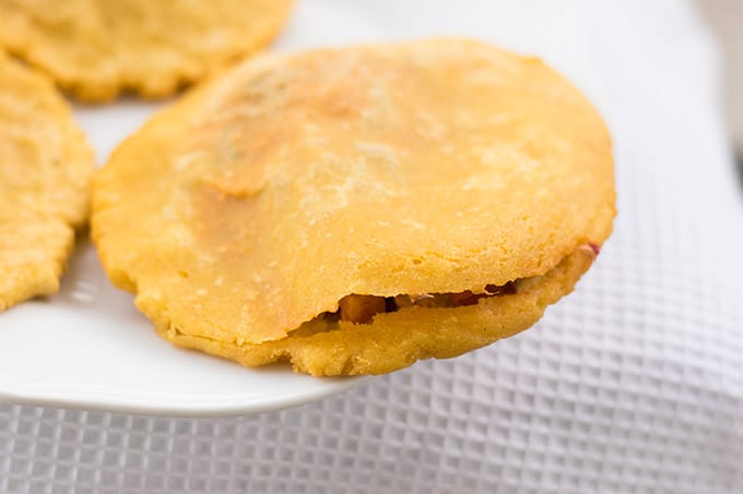 Gorditas recipe with maseca on a white plate.