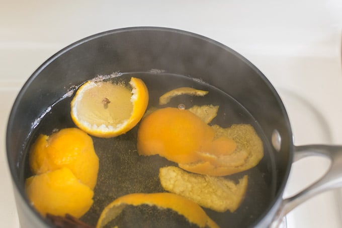 orange peels, cinnamon and cloves simmering.