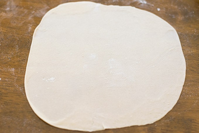 Rolled out bunuelo dough.