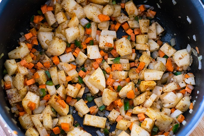 vegetables for picadillo in a pot