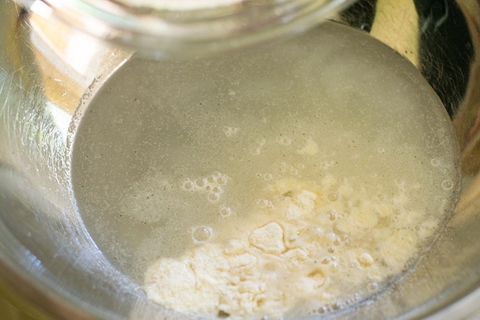 mixing precooked cornmeal and water