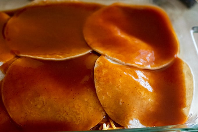 tortillas covered in enchilada sauce