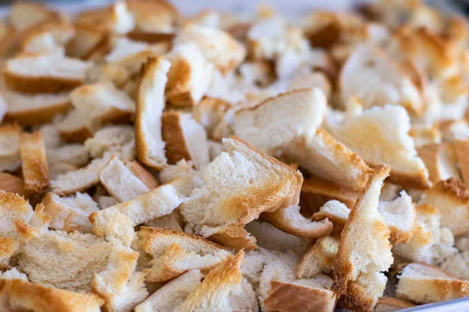 Toasted sandwich bread pieces in a large bowl.