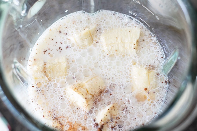 banana milkshake ingredients in a blender