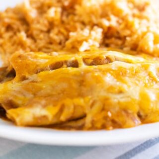 ground beef enchiladas on a plate