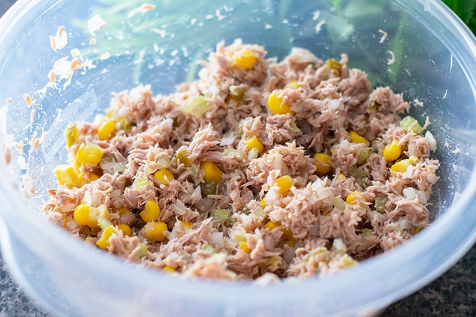 mixing tuna salad ingredients