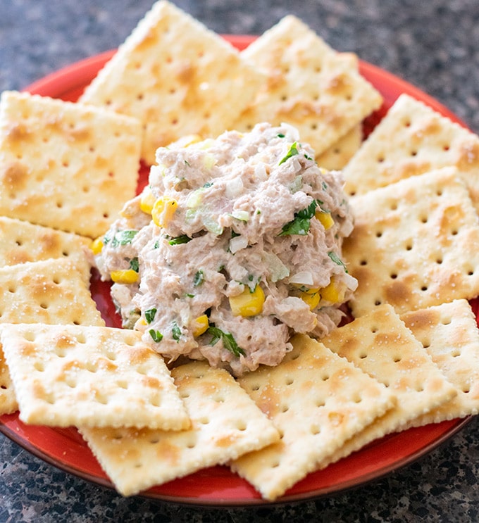 mexican tuna salad on a plate with crackers