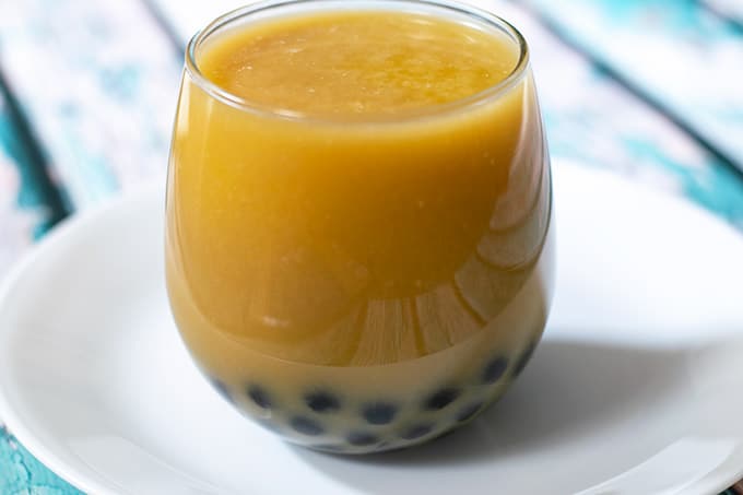 mango bubble tea in a glass