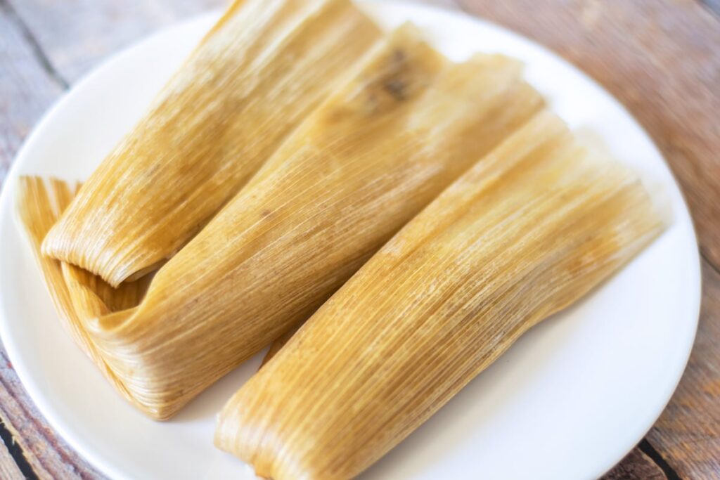 tamales dulces on a white plate