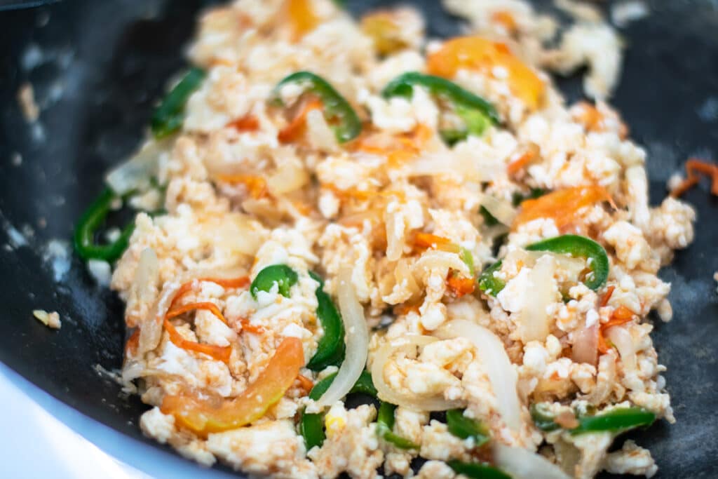 Spicy scrambled egg whites in a skillet.
