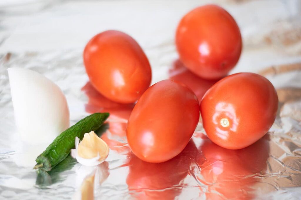 salsa ingredients on a baking tray