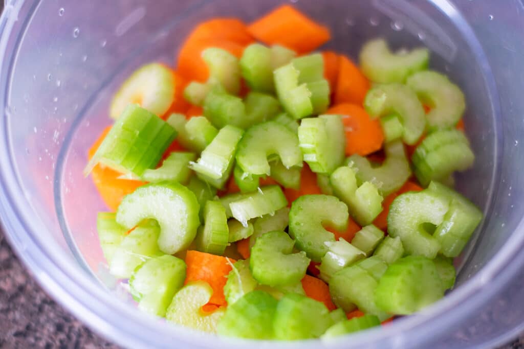 chopped celery and carrots in a bowl.
