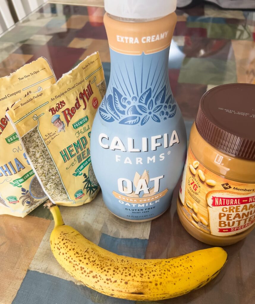 Ingredients for a smoothie with oat milk.