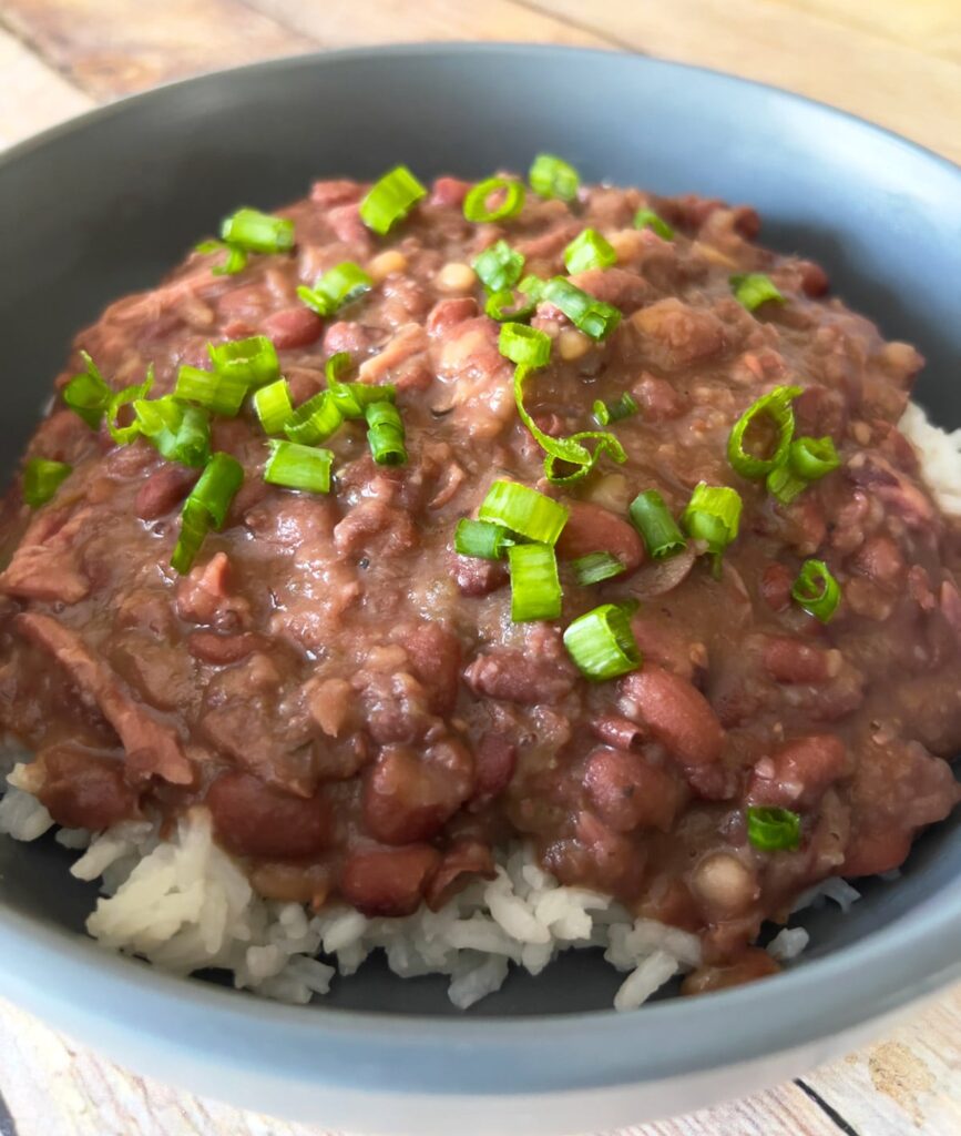 Red beans and rice with ham hock in a bowl.