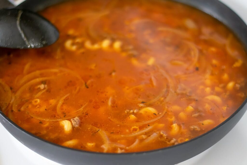 Mexican sopa de coditos in a skillet.