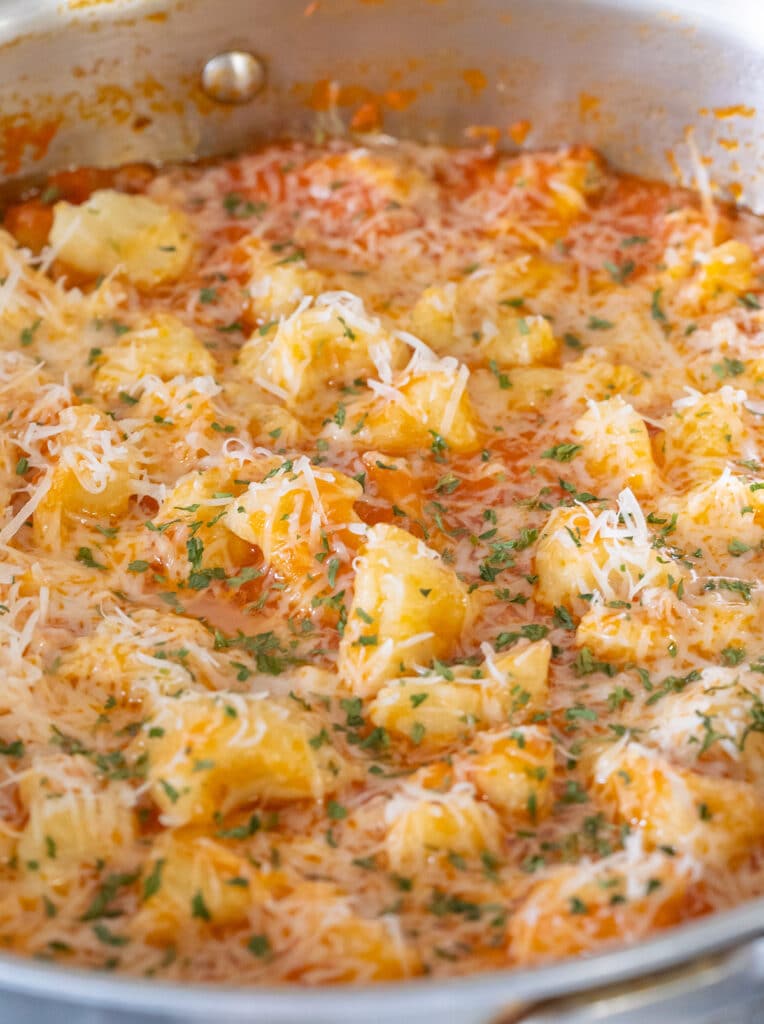 Gnocchi in tomato sauce in a pan.