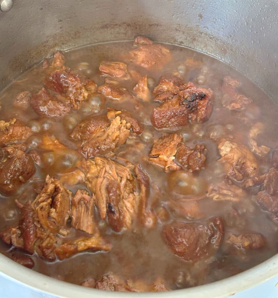 Coca Cola carnitas in a pot.