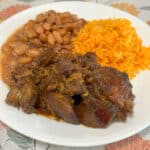 Coca Cola carnitas with rice and beans