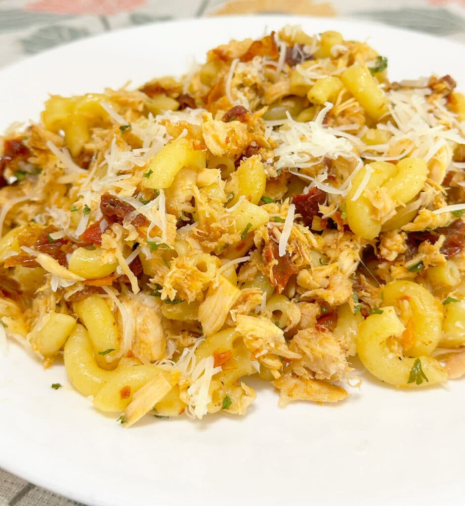 A plate of pasta with canned tuna.